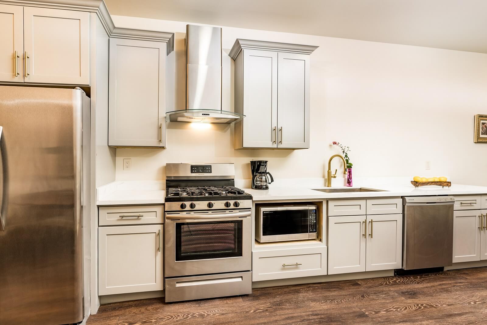 The Alexandre Unit 405 kitchen, a New Orleans luxury rental.